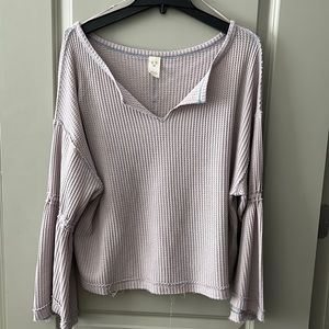 Free people light purple waffle knit top with bell sleeves. Size small